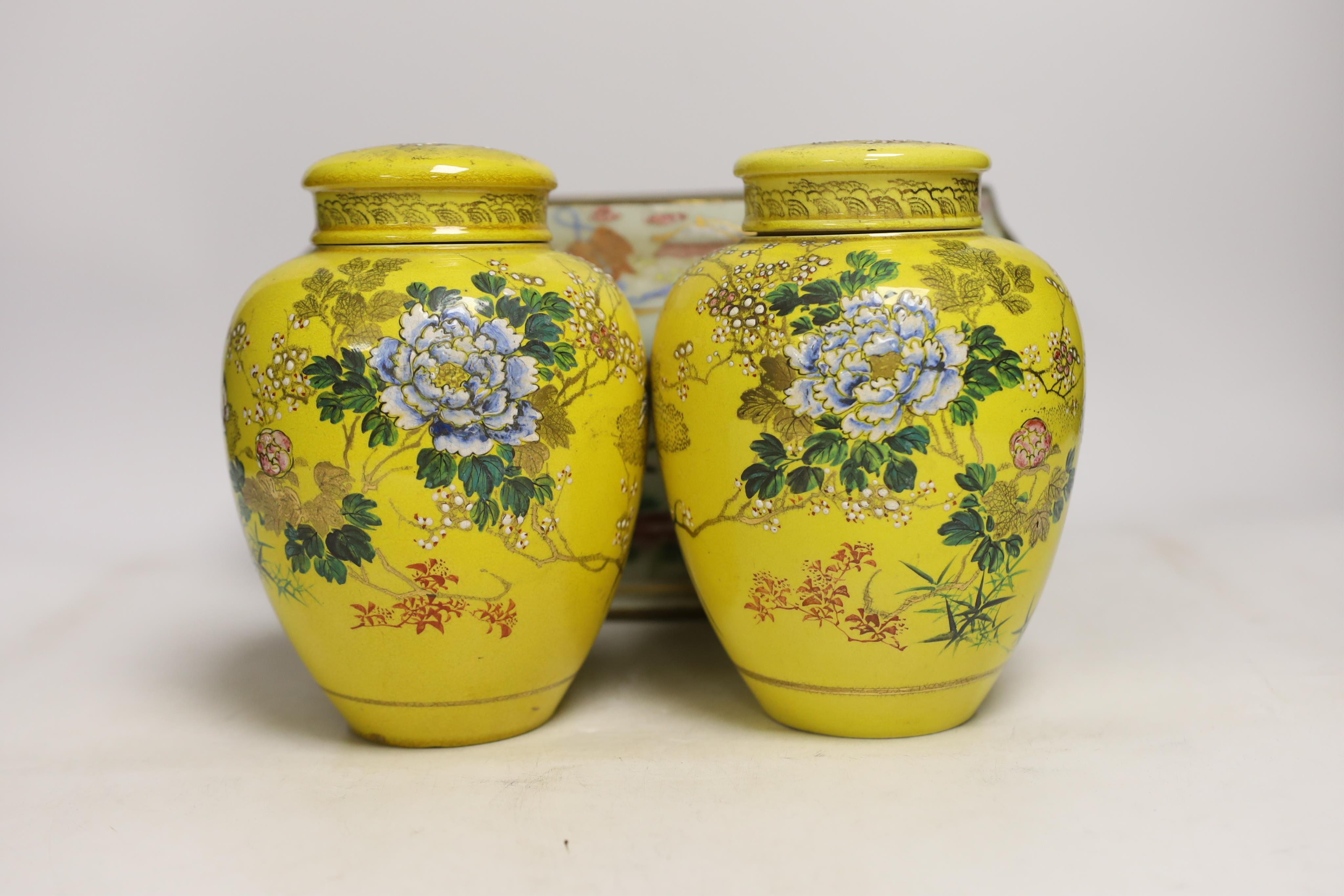 A 19th century Chinese famille rose tureen (lacking cover), a bronze mirror, a brush pot, a crackle glazed teabowl and a pair of Japanese yellow glazed satsuma jars and covers, tallest 18cm (6)